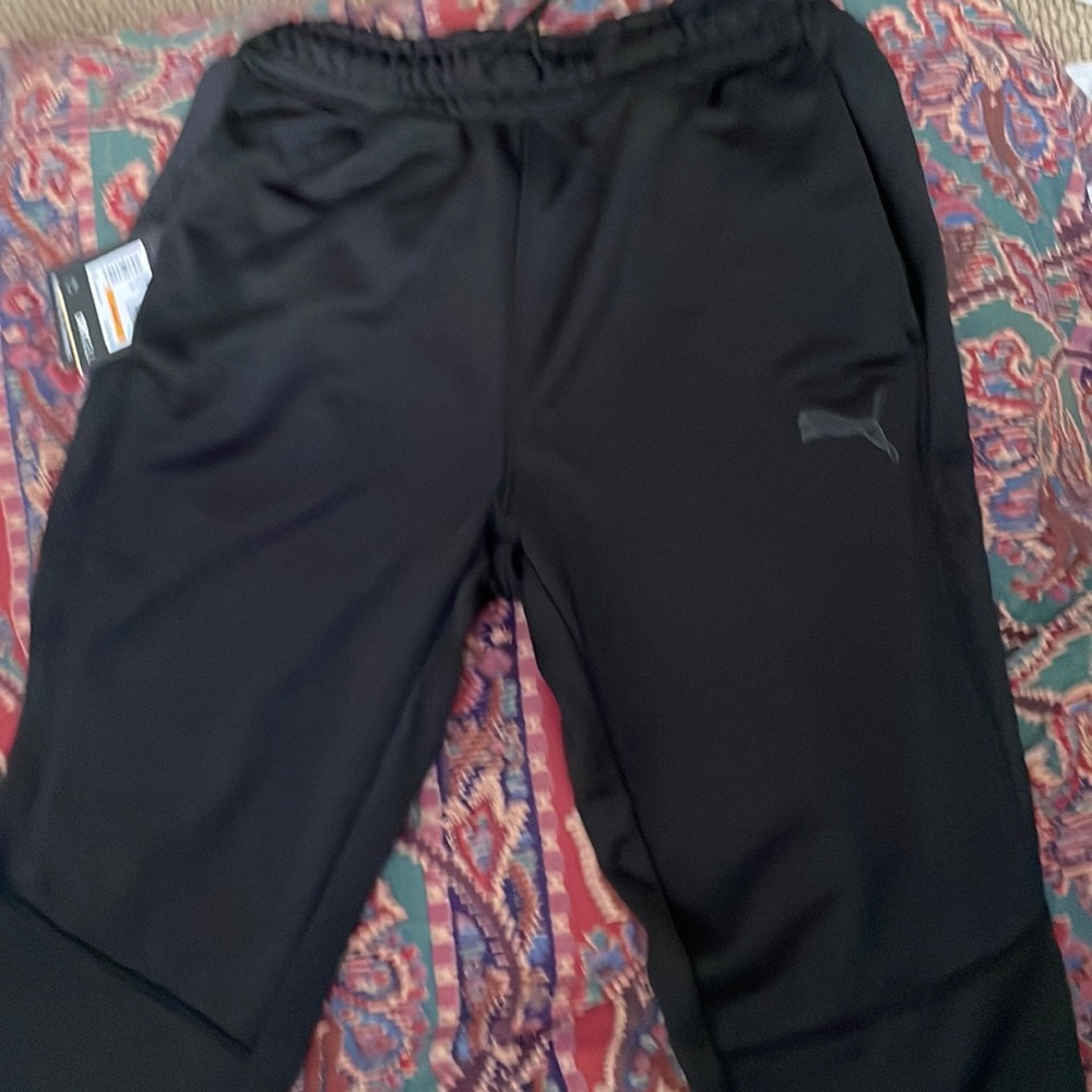 Brand new, never worn, Puma dry cell track pants,